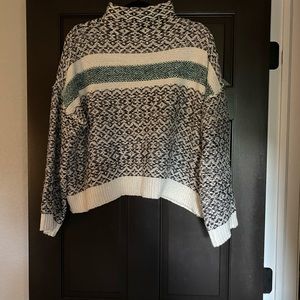 Versatile! Comfy and cute with jeans or dressed up with black pants and boots!